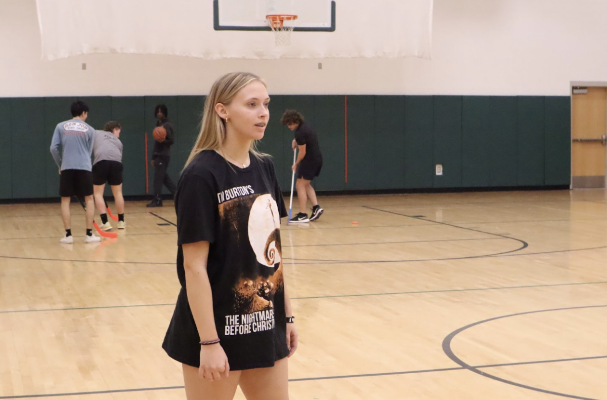Sophomore Carly McDermott participates in an activity during gym class.